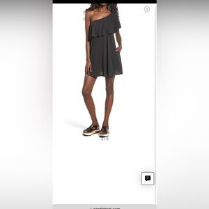 Black one shoulder dress. Stock photo included. No tags but never worn. Size S.